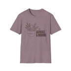 Gathered And Growing homeschool mom graphic t-shirt with a gathered-at-home inspired graphic with books, florals, and cozy family learning details