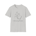 Cultivating Wonder with Flowers homeschool mom graphic t-shirt with a Charlotte Mason-inspired design with books, nature details, and vintage homeschool charm