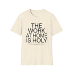 Work At Home Is Holy homeschool mom graphic t-shirt with a gathered-at-home inspired graphic with books, florals, and cozy family learning details