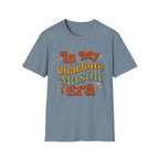 In My Charlotte Mason Era homeschool mom graphic t-shirt with a Charlotte Mason-inspired design with books, nature details, and vintage homeschool charm