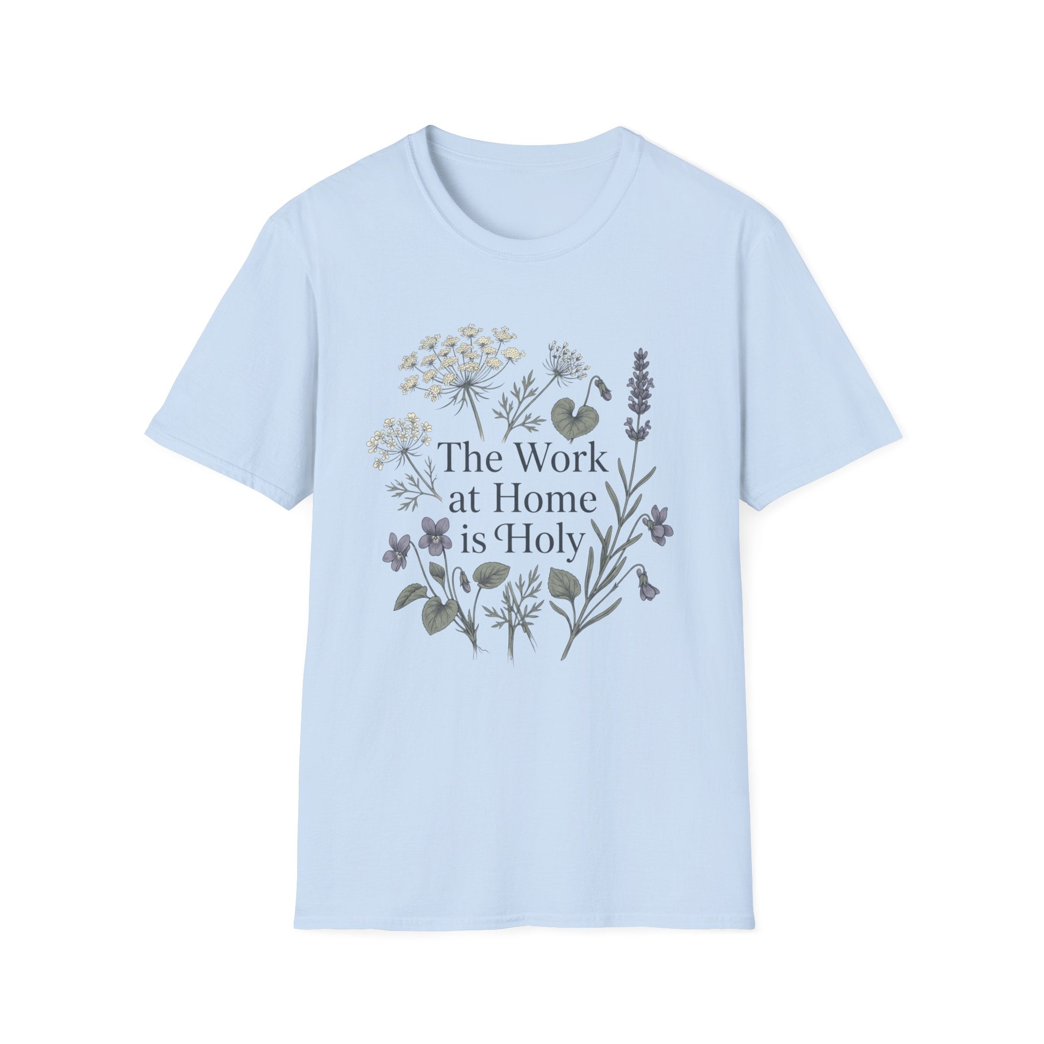 The Work At Home Is Holy homeschool mom graphic t-shirt with a gathered-at-home inspired graphic with books, florals, and cozy family learning details