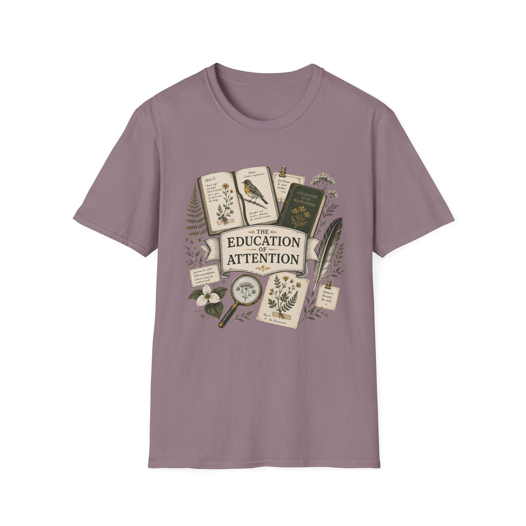 The Education Of Attention homeschool mom graphic t-shirt with a Charlotte Mason-inspired design with books, nature details, and vintage homeschool charm