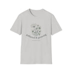 Gathered & Growing homeschool mom graphic t-shirt with a gathered-at-home inspired graphic with books, florals, and cozy family learning details