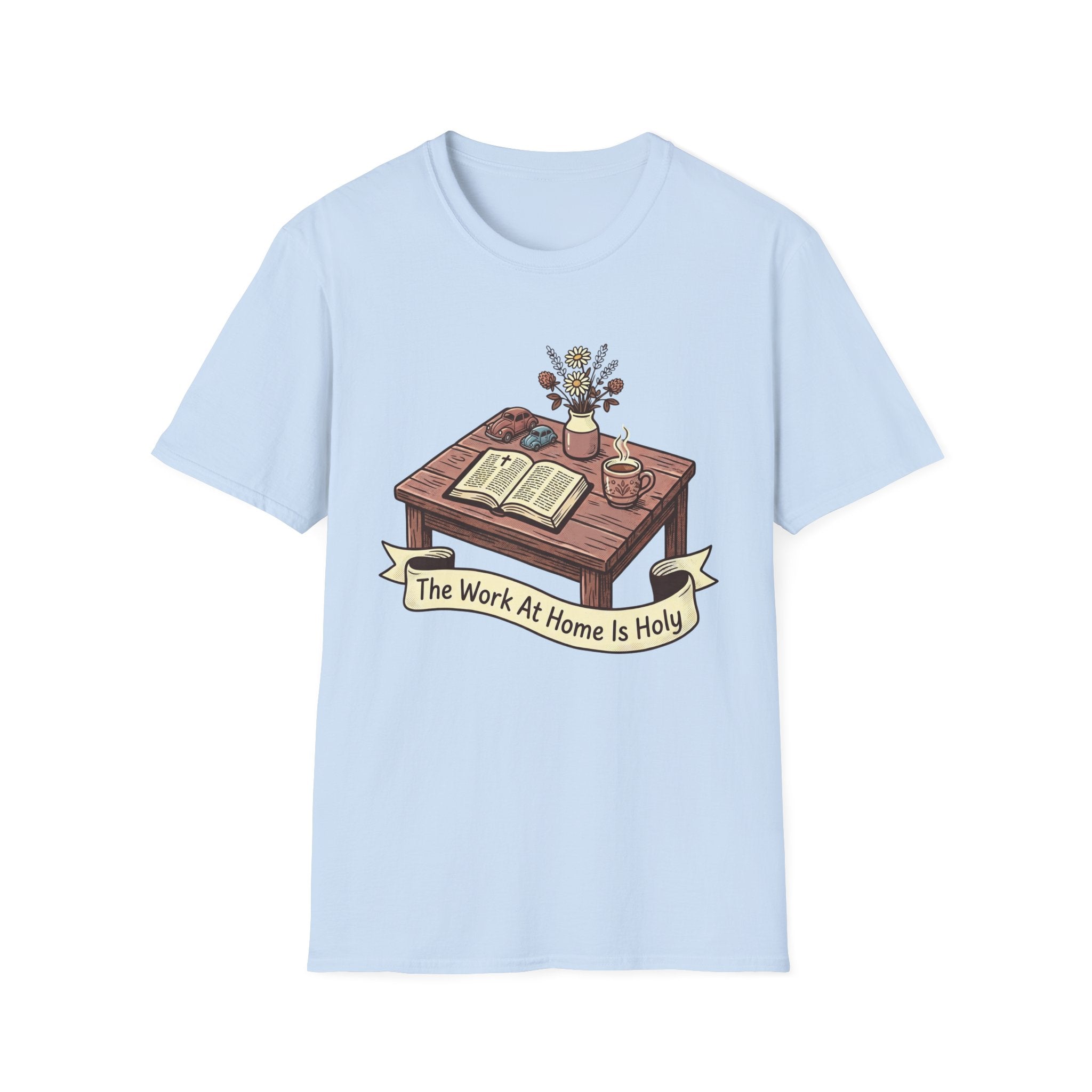 The Work At Home Is Holy homeschool mom graphic t-shirt with a gathered-at-home inspired graphic with books, florals, and cozy family learning details