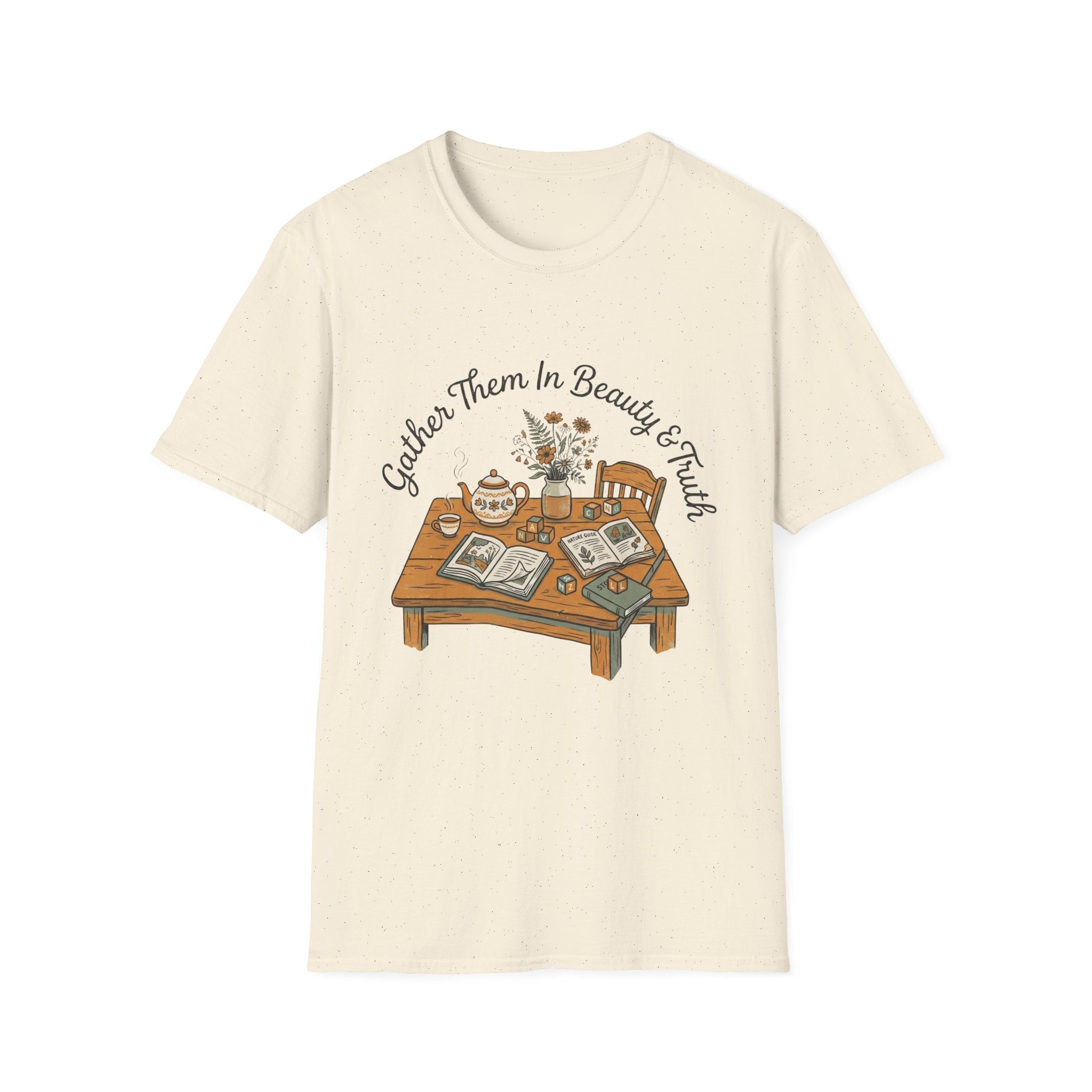 Gather Them In Beauty homeschool mom graphic t-shirt with a gathered-at-home inspired graphic with books, florals, and cozy family learning details