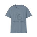 Cultivating Wonder with Flowers homeschool mom graphic t-shirt with a Charlotte Mason-inspired design with books, nature details, and vintage homeschool charm