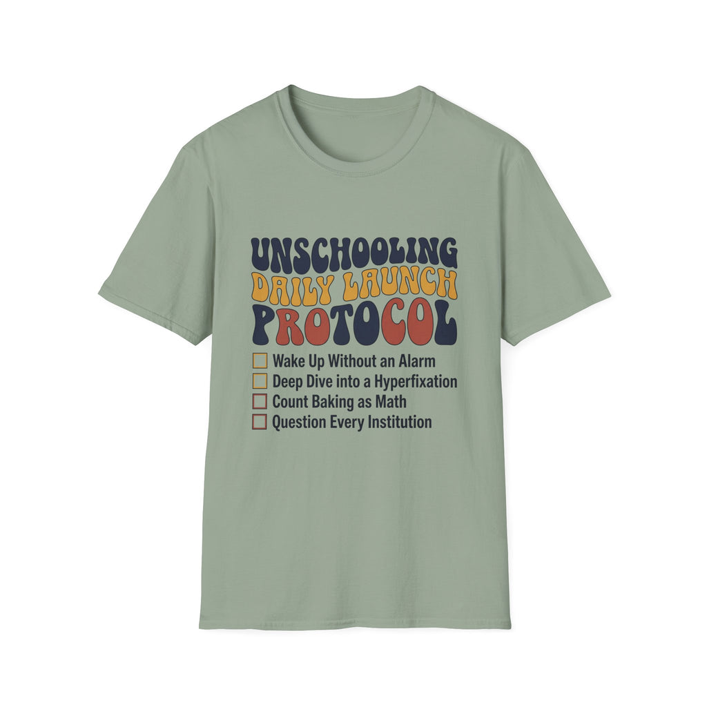 Unschooling Protocol homeschool mom graphic t-shirt with an adventurous homeschool graphic with nature, books, and outdoor learning energy